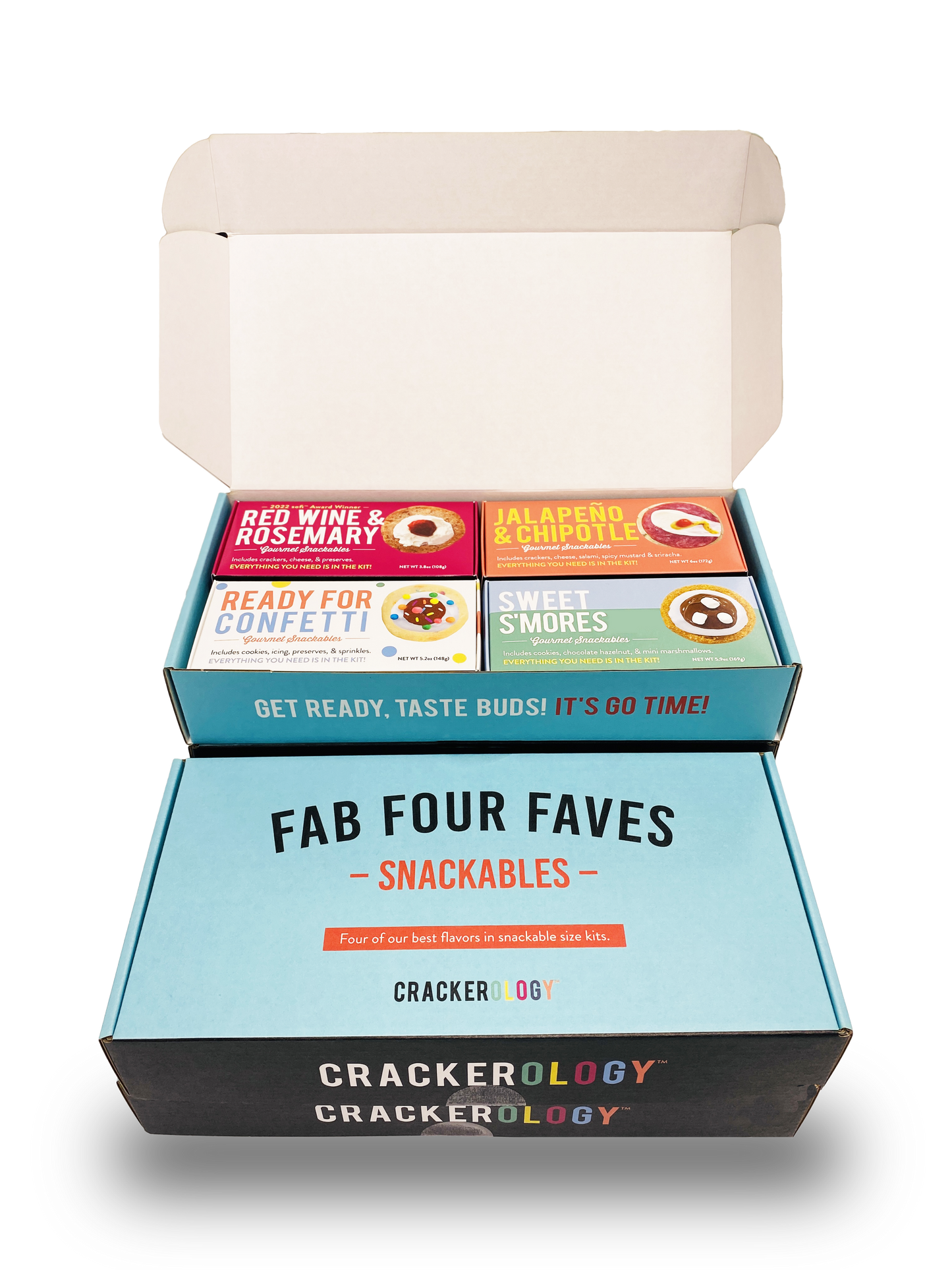 A box labeled 'Fab Four Faves' from Crackerology, containing various snackable kits with different flavors. Red Wine & Rosemary, Jalapeno & Chipotle, Ready for Confetti, and Sweet S'mores.