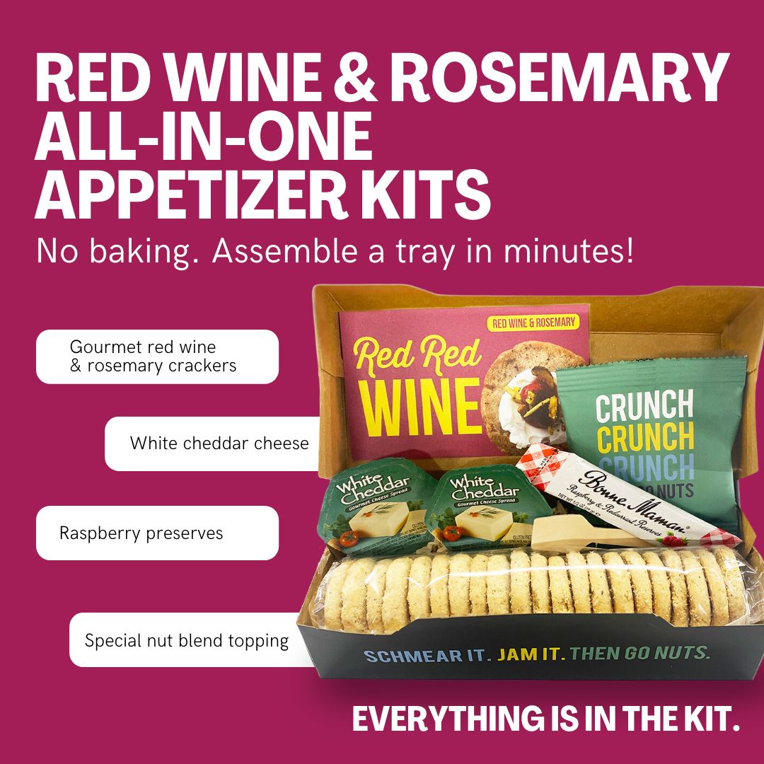 A detailed description of what is in the kit: Crackers, cheese, raspberry jam and a nut topping.
