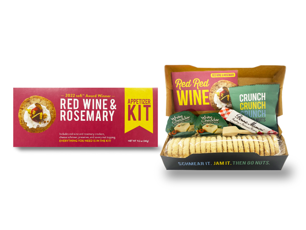 Packaging of Red Wine & Rosemary Appetizer Kit, showing the box and contents including crackers, cheese spread, and nuts.